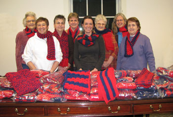 Photo of some of the volunteers who made the Special Olympics scarves